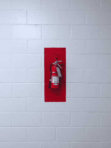 fire extinguisher hung on the wall