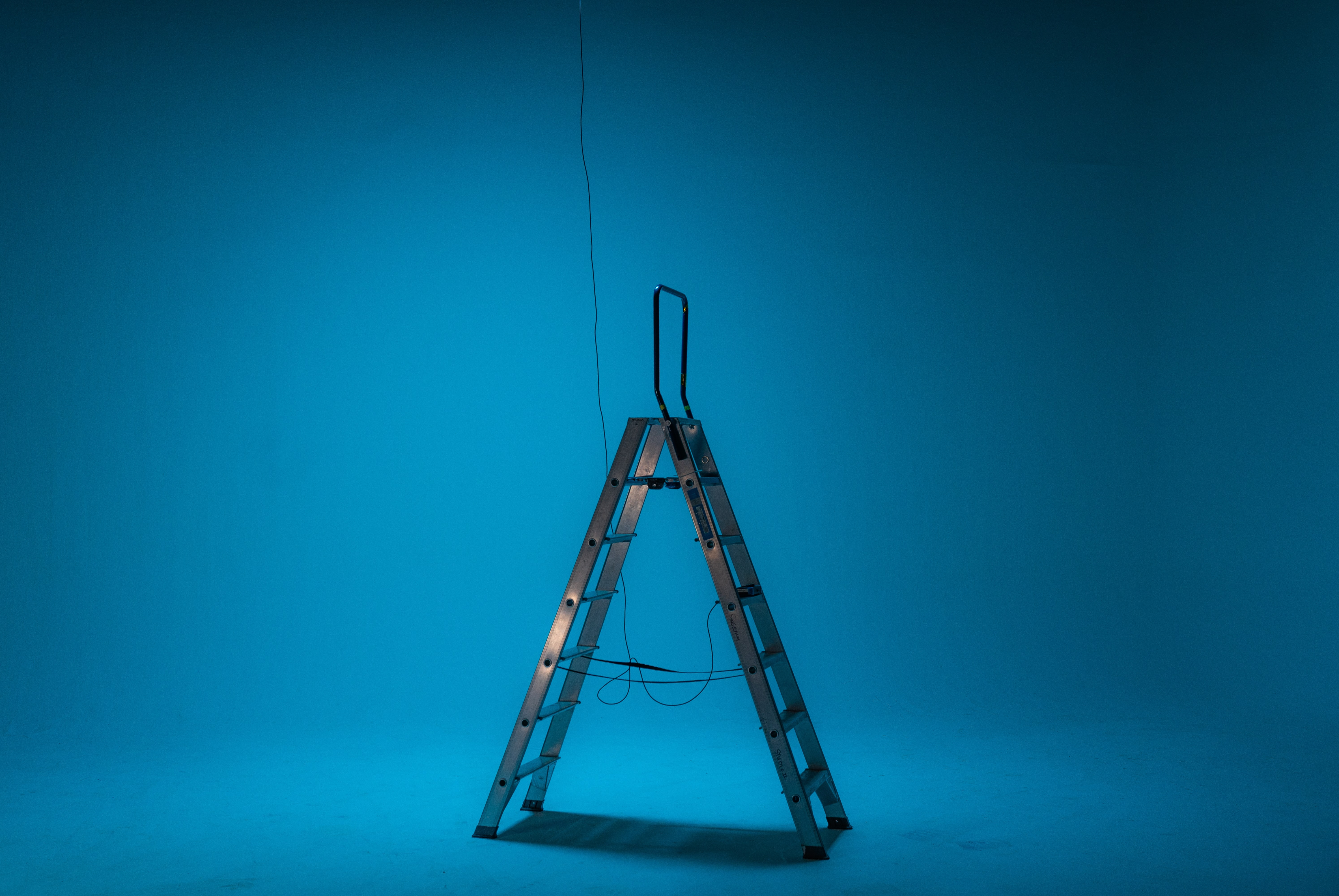 a step ladder in an empty room