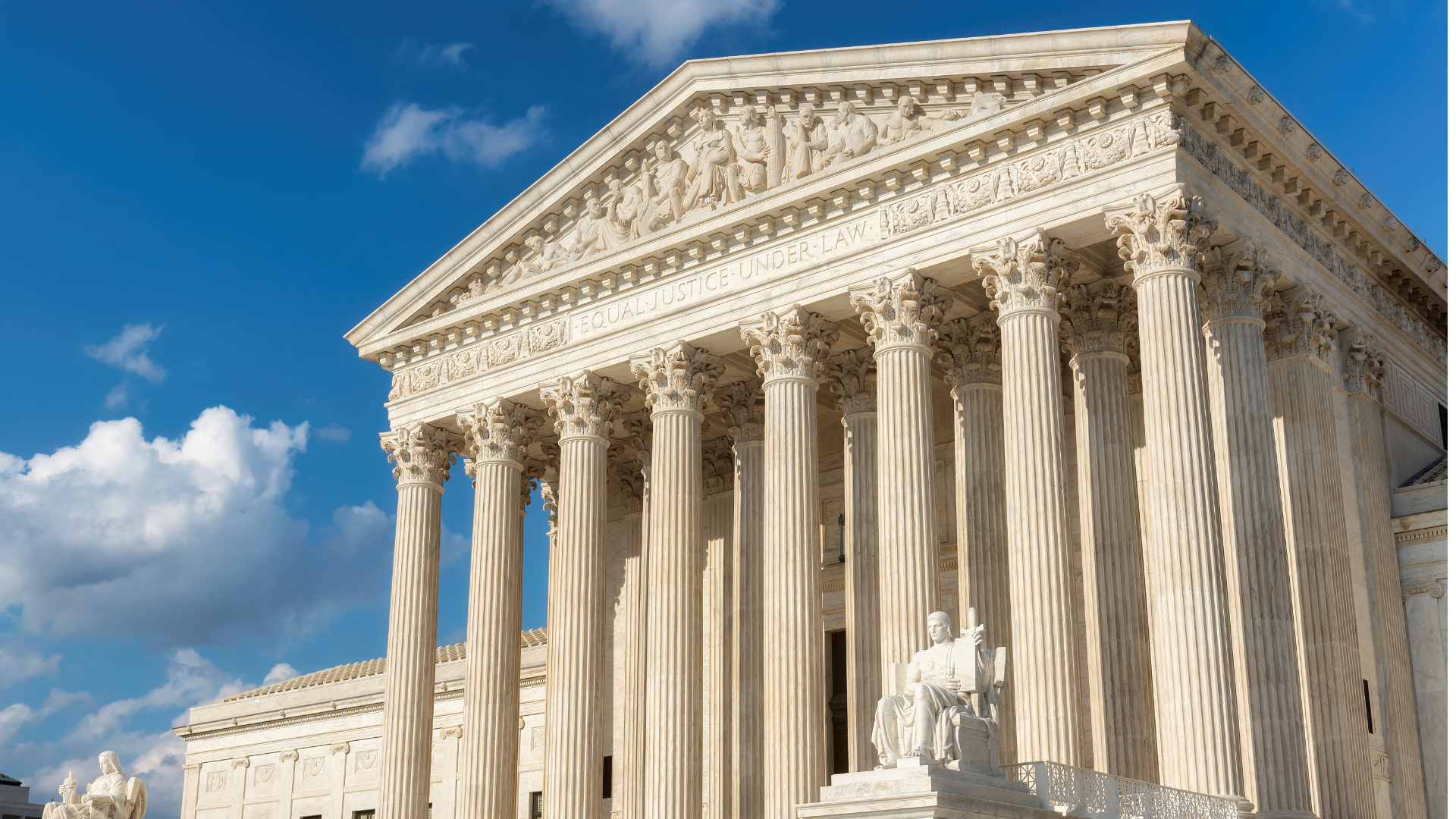 front-facing image of the Supreme Court on a sunny day