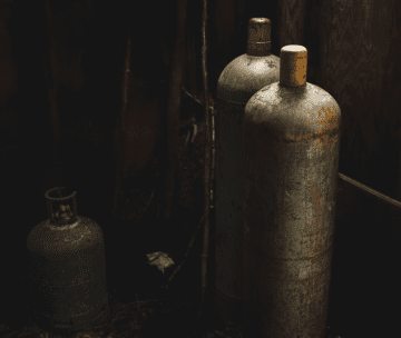 three gas cylinders