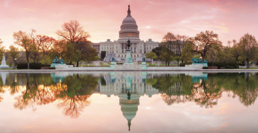 Photo of the Capitol at dawn from the reflecting pool.